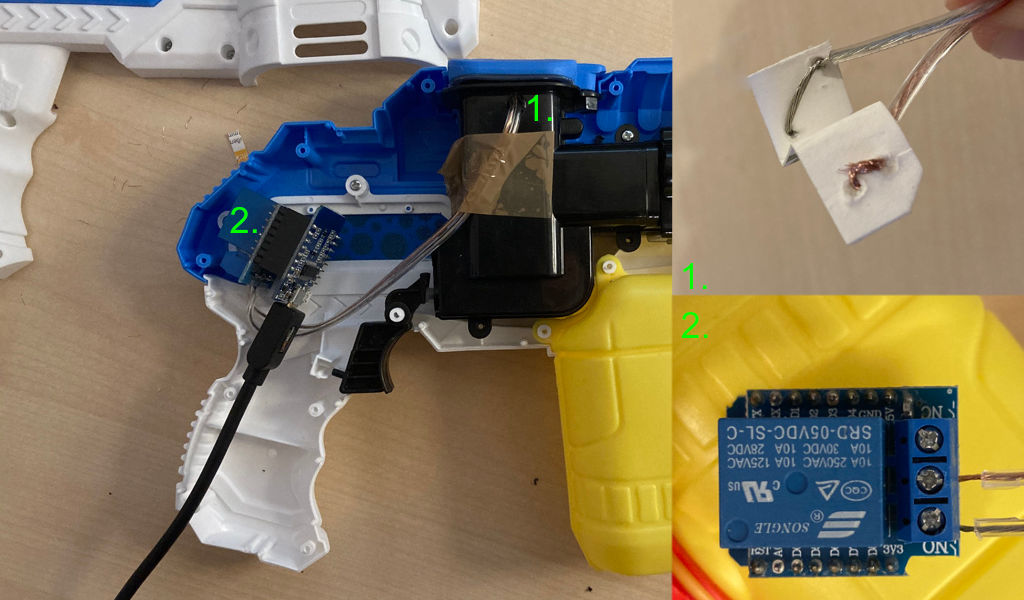 The water gun with the paper contraption and the microcontroller installed